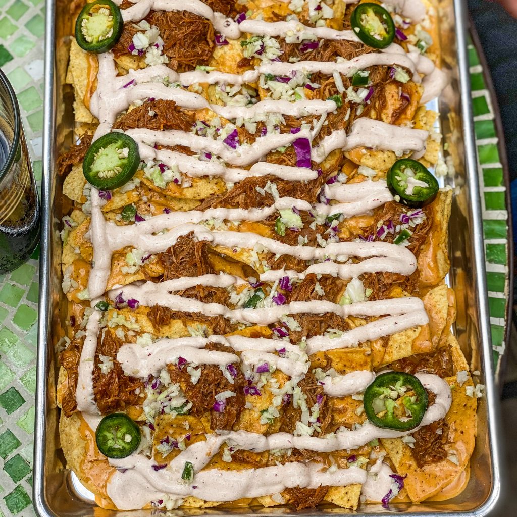BBQ pulled pork nachos at Grape Juice restaurant in Kerrville. The Luxurious Escape to the Heart of Texas Hill Country You Need To Book. Dwell Well Experience. Dwell Well Rental Properties. Kerrville, TX. Fredericksburg, TX. Texas Hill Country