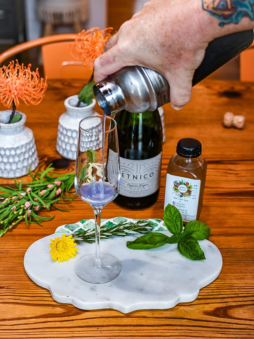 Three travel inspired cocktails from around the world. The Saints 75 cocktail. New Orleans French 75 cocktail recipe, Commander's Palace Saints 75 cocktail recipe, Empress 1908 Gin, New Orleans inspired cocktails, southern cocktail recipes