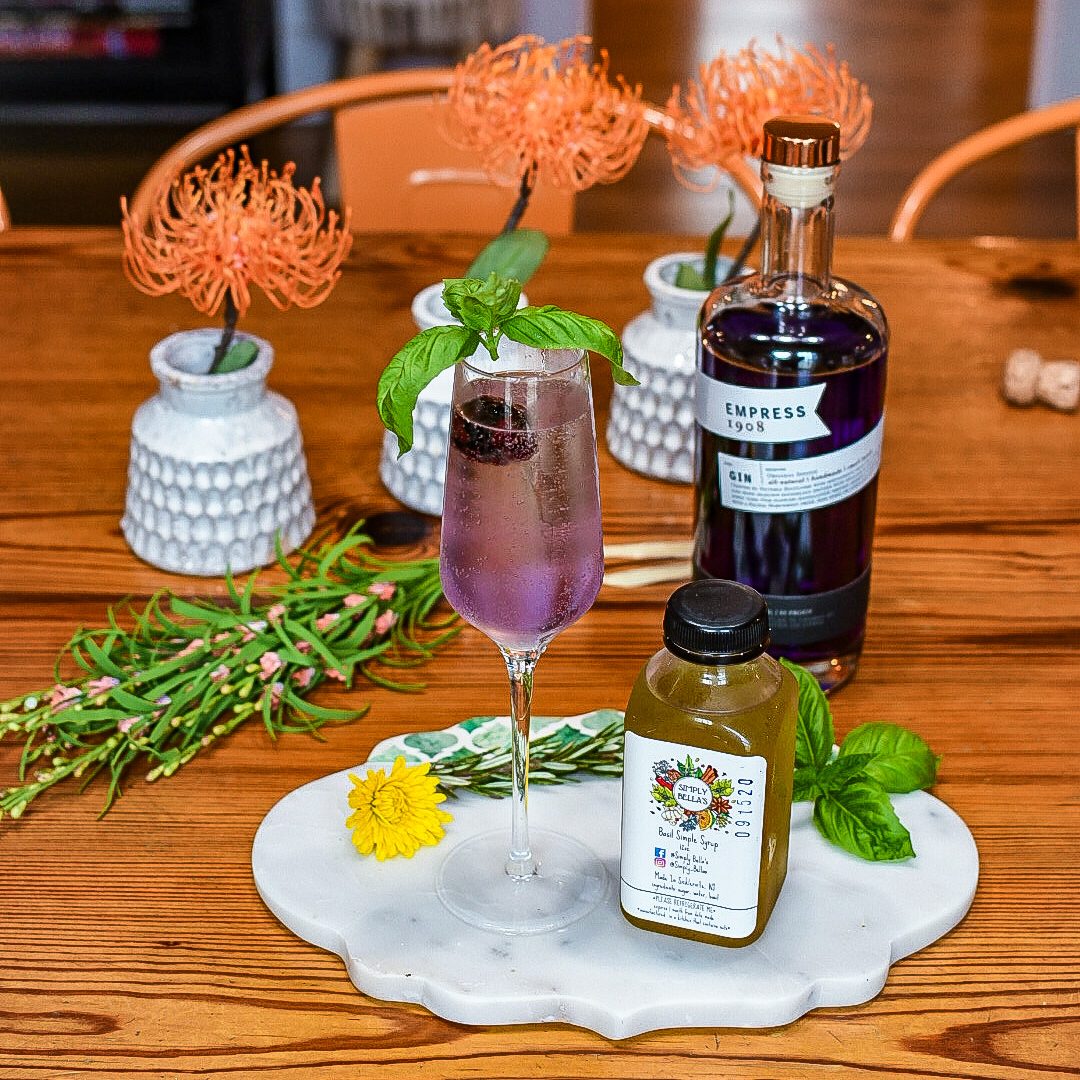 Three travel inspired cocktails from around the world. The Saints 75 cocktail. New Orleans French 75 cocktail recipe, Commander's Palace Saints 75 cocktail recipe, Empress 1908 Gin, New Orleans inspired cocktails, southern cocktail recipes